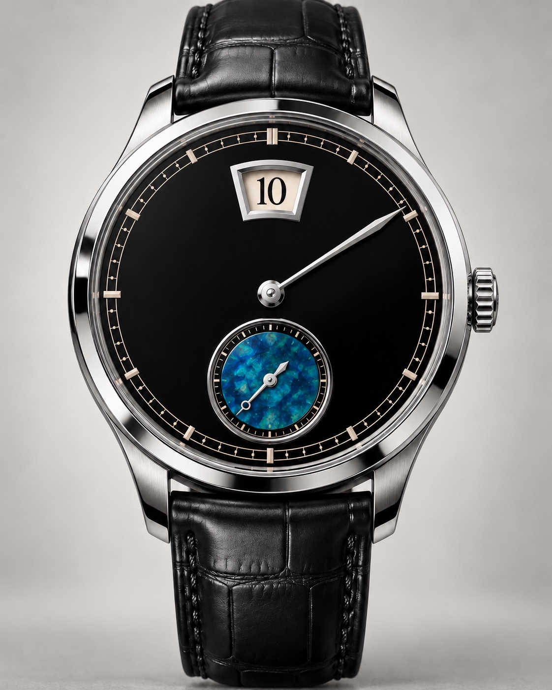 Black jumping hour watch design with blue mineral subdial